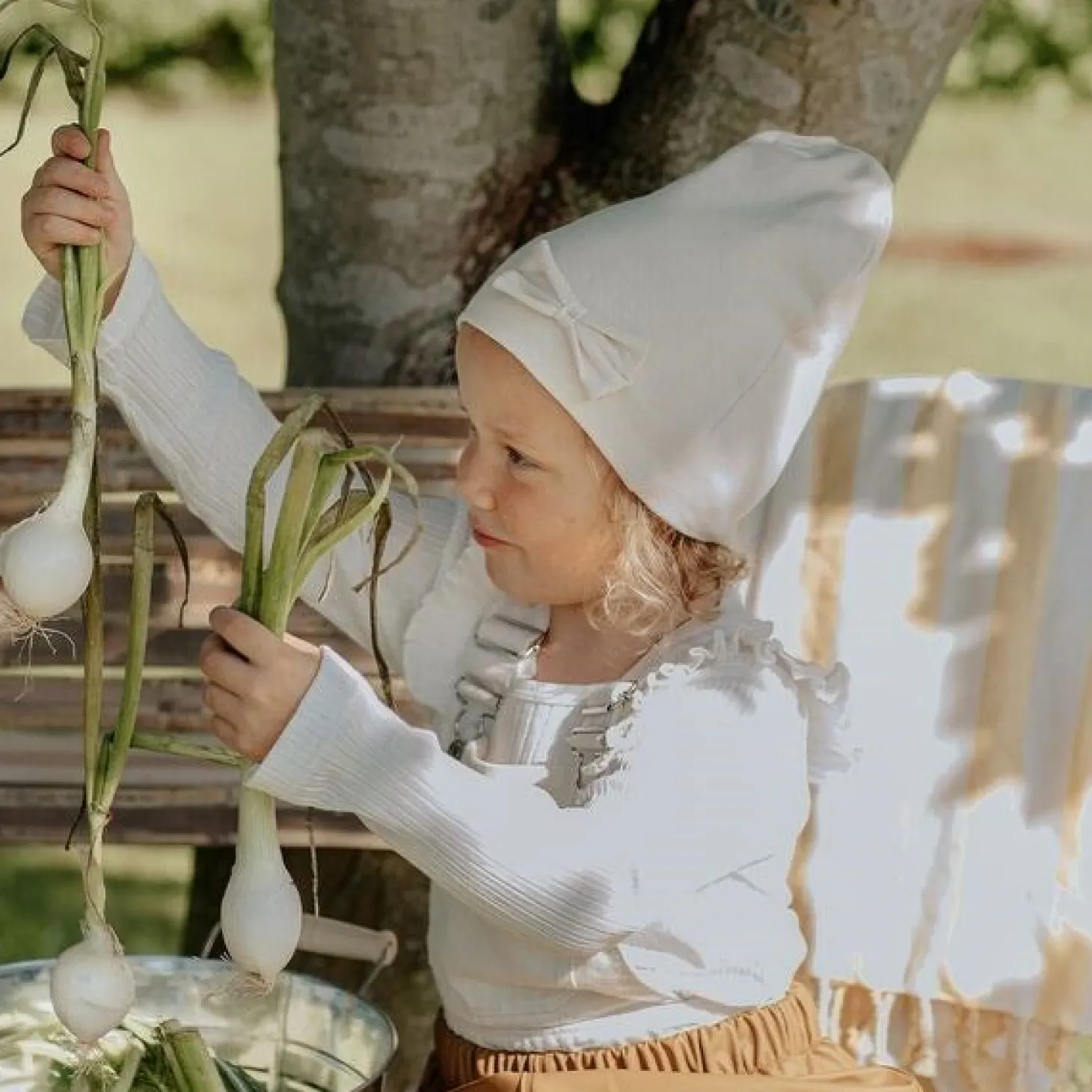 Racing Kids Tophue Windproof 2-lags Sløjfe Eggshell